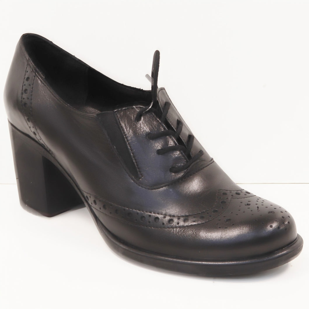 WINGTIP HEEL