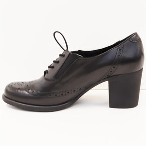 WINGTIP HEEL