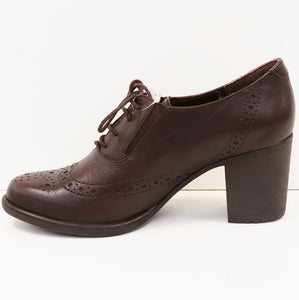 WINGTIP HEEL